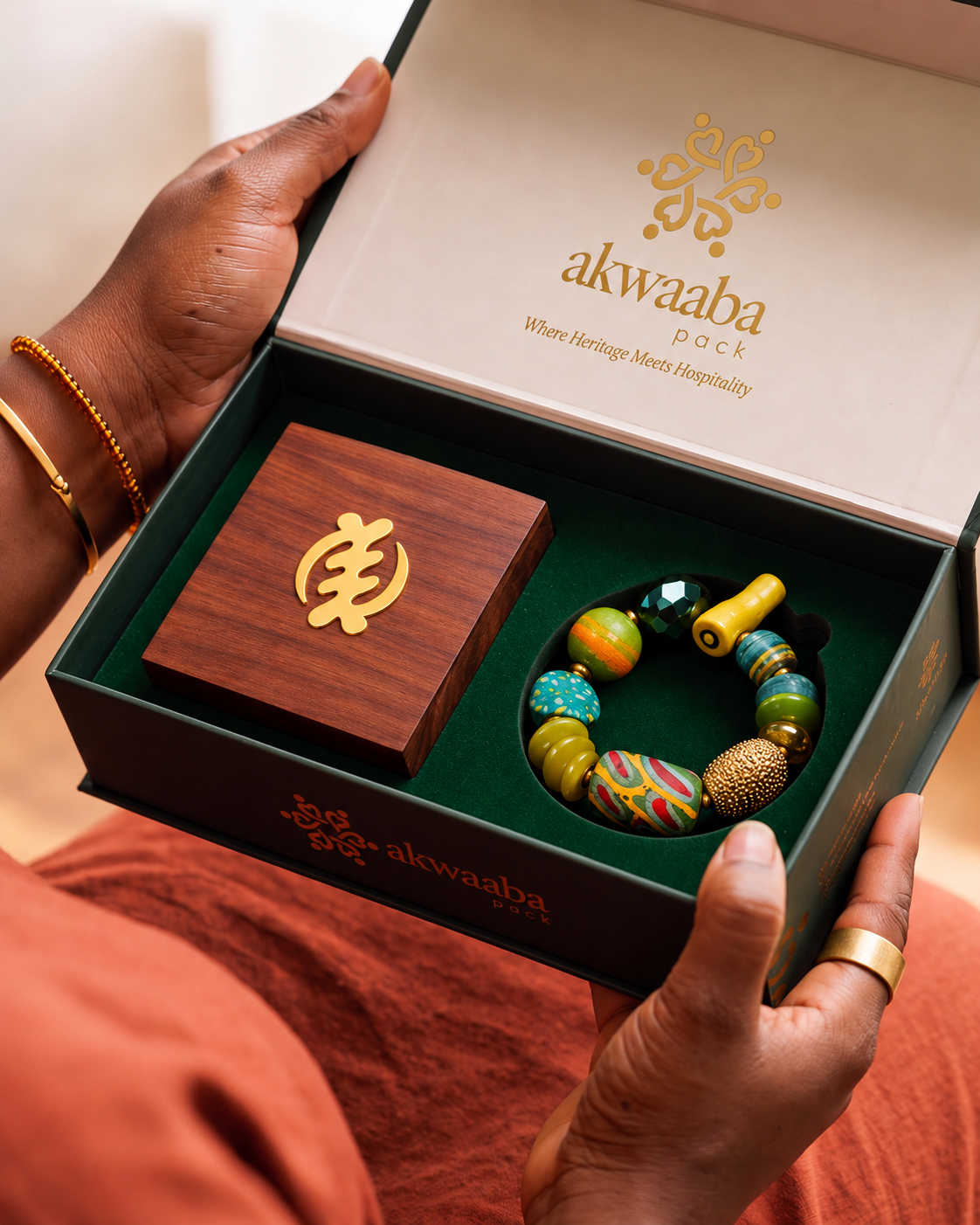 Owulo Set 2 with Gye Nyame jewellery box and colourful beads, held in an open gift box